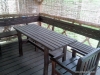 Dřevěná pergola i s krbem a zahradním nábytkem