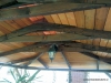 Dřevěná pergola i s krbem a zahradním nábytkem